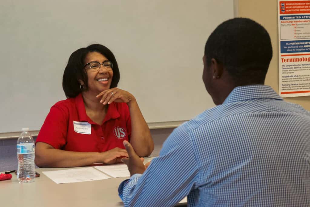 a united states by permaco employee interviewing a participant.