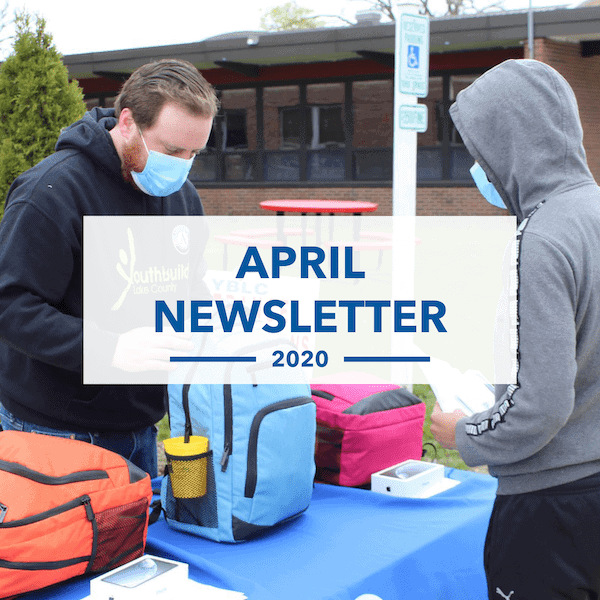 Two people wearing face masks stand at a table outdoors with colorful backpacks and boxes. The text “April Newsletter 2020” is overlaid in the center of the image.