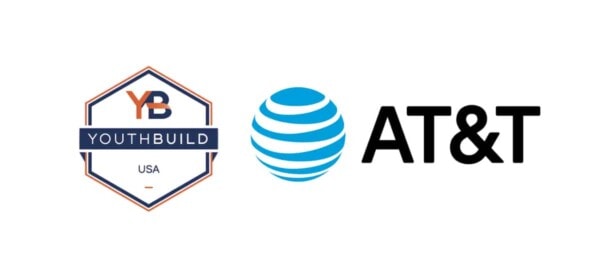 YouthBuild USA hexagon logo with “YB YouthBuild USA” next to the AT&T logo, which includes a blue globe icon and the text “AT&T” in black. Both logos are on a white background.