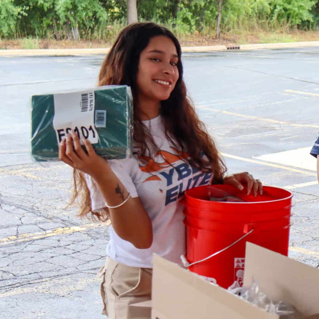 girl holding a book]