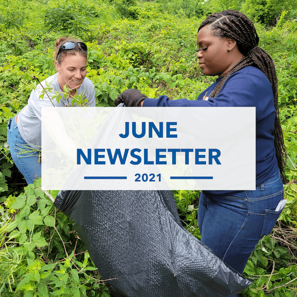 Two women pick up trash in a green, leafy area. One holds a garbage bag open while the other places debris inside. Overlaid text reads: June Newsletter 2021.